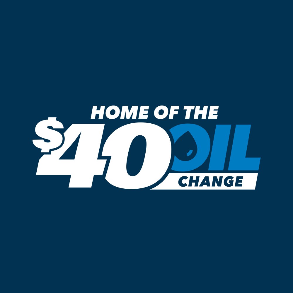 Graphic reading Home of the $40 Oil Change, in white and blue type on a navy background, with an oil drop inside the letter O of OIL.